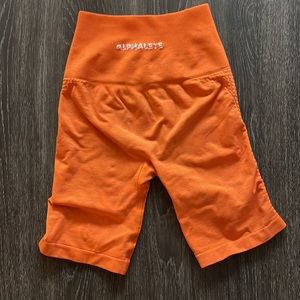 Alphalete Seamless shorts. Orange. Never worn. XS.